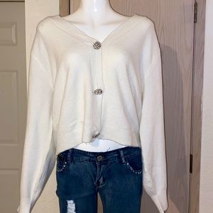 Cropped white fuzzy cardigan with diamond like buttons